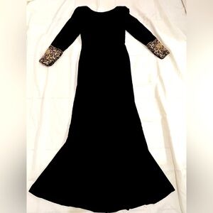 Vintage 1990’s Victor Costa black velvet fishtail gown with jeweled cuffs